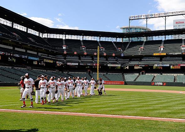 The Baltimore Orioles celebrate after a 8-2 victory against the Chicago White Sox at Oriole Park at Camden Yards.