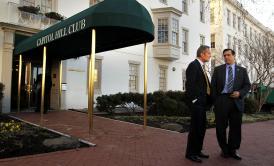Rep. Darrell Issa (right) talks to Rep. Todd Akin, R.-Mo., outside the RNC headquarters in March 2011