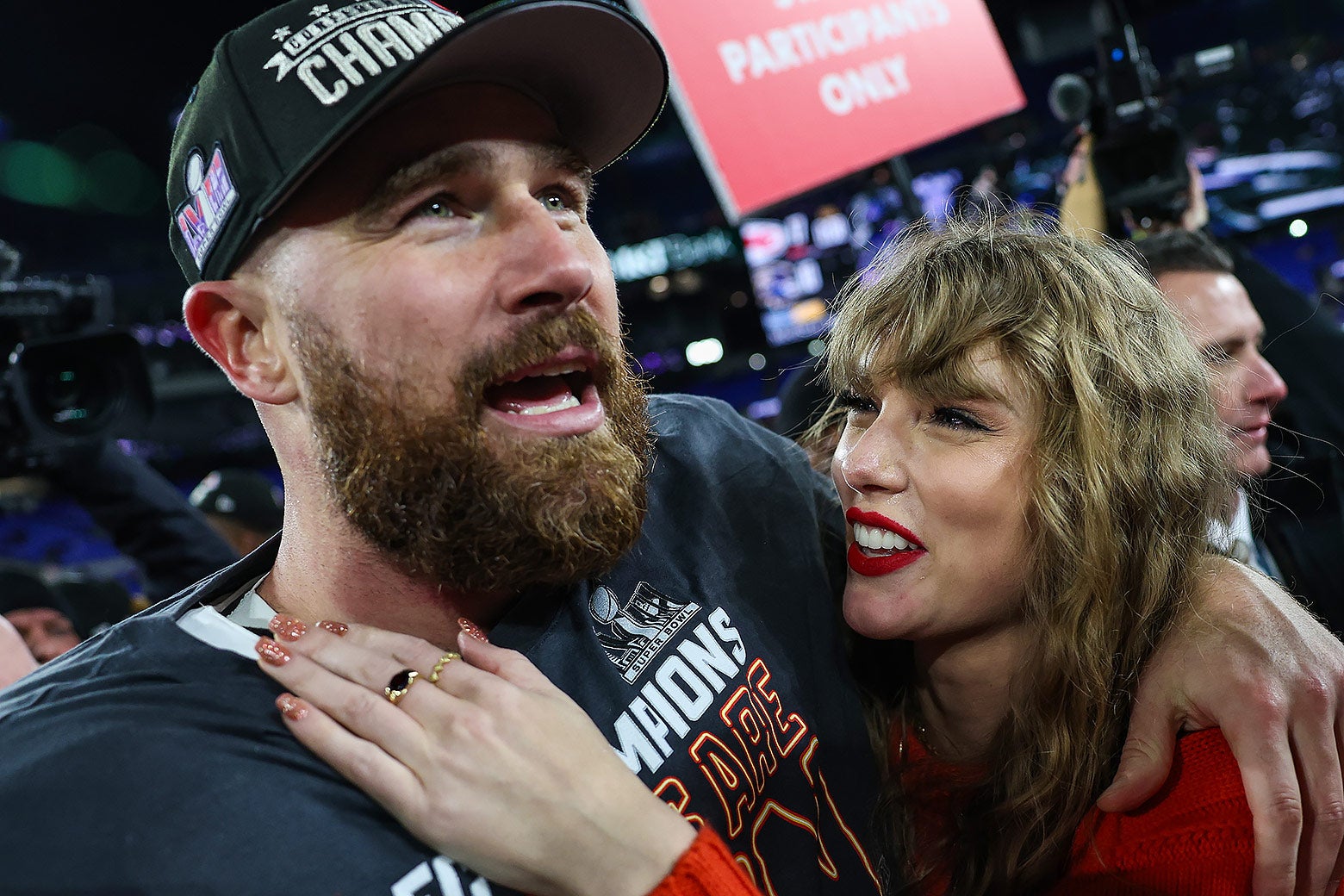 Travis Kelce and Taylor Swift embrace