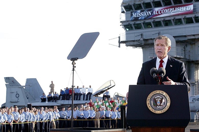 President George W. Bush addresses the nation aboard the nuclear aircraft carrier USS Abraham Lincoln on 1 May, 2003, as it sails for Naval Air Station North Island, San Diego, California. 