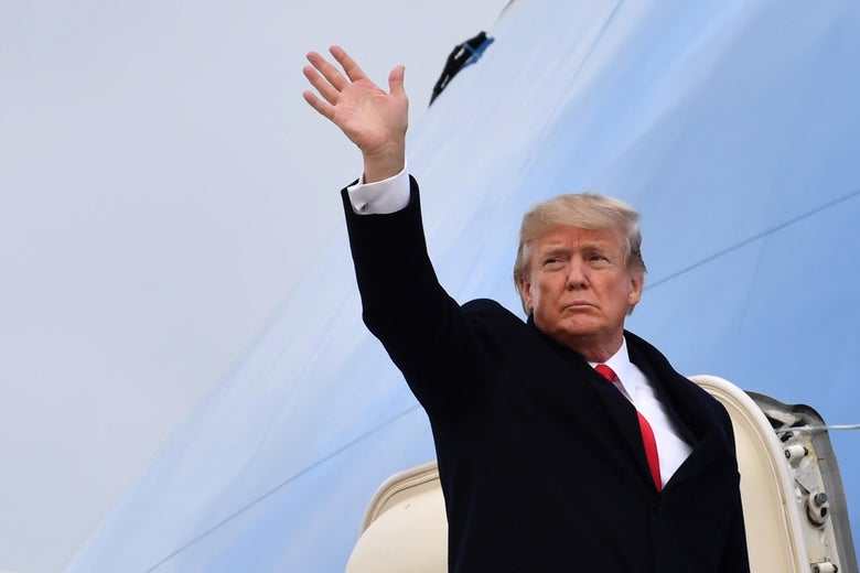US President Donald Trump waves before boarding the Air Force One ahead of his departure from Zurich Airport in Zurich on January 26, 2018, after attending the World Economic Forum (WEF) annual meeting in Davos. / AFP PHOTO / Nicholas Kamm        (Photo credit should read NICHOLAS KAMM/AFP/Getty Images)