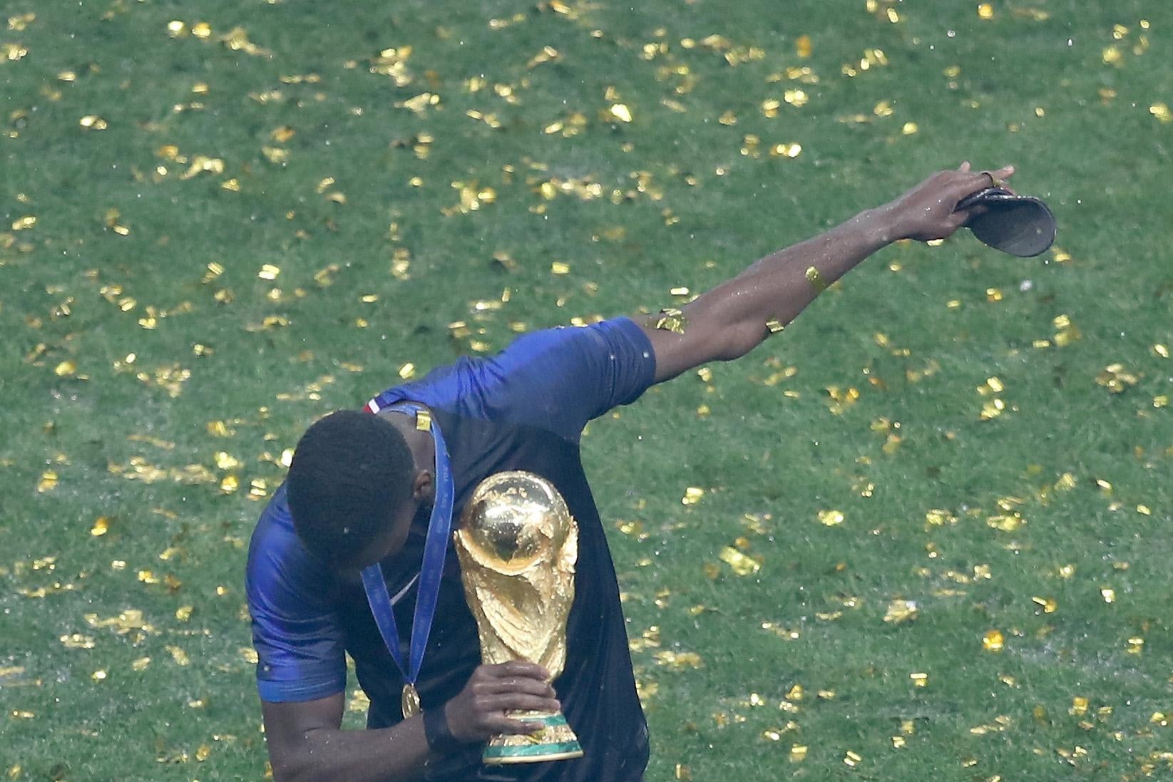 Paul Pogba of France celebrates with the World Cup Trophy on July 15, 2018 in Moscow, Russia. 