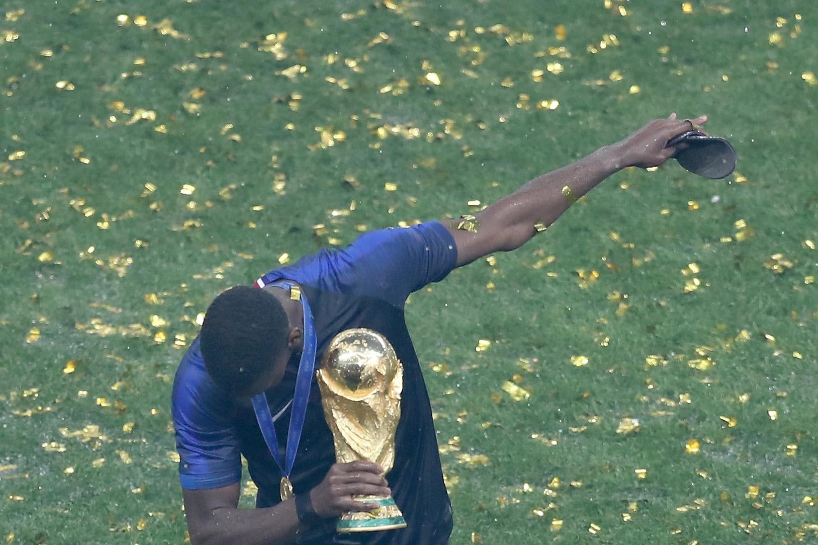 This photo of a celebrating Macron captures the excitement of France's World  Cup win.