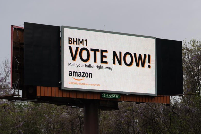 An Amazon-sponsored billboard urging employees to return their unionization ballots.