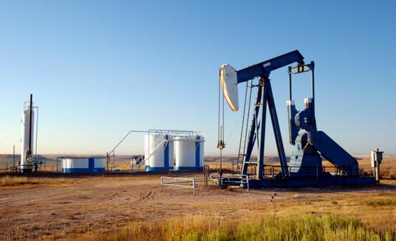 Oil well and storage tanks