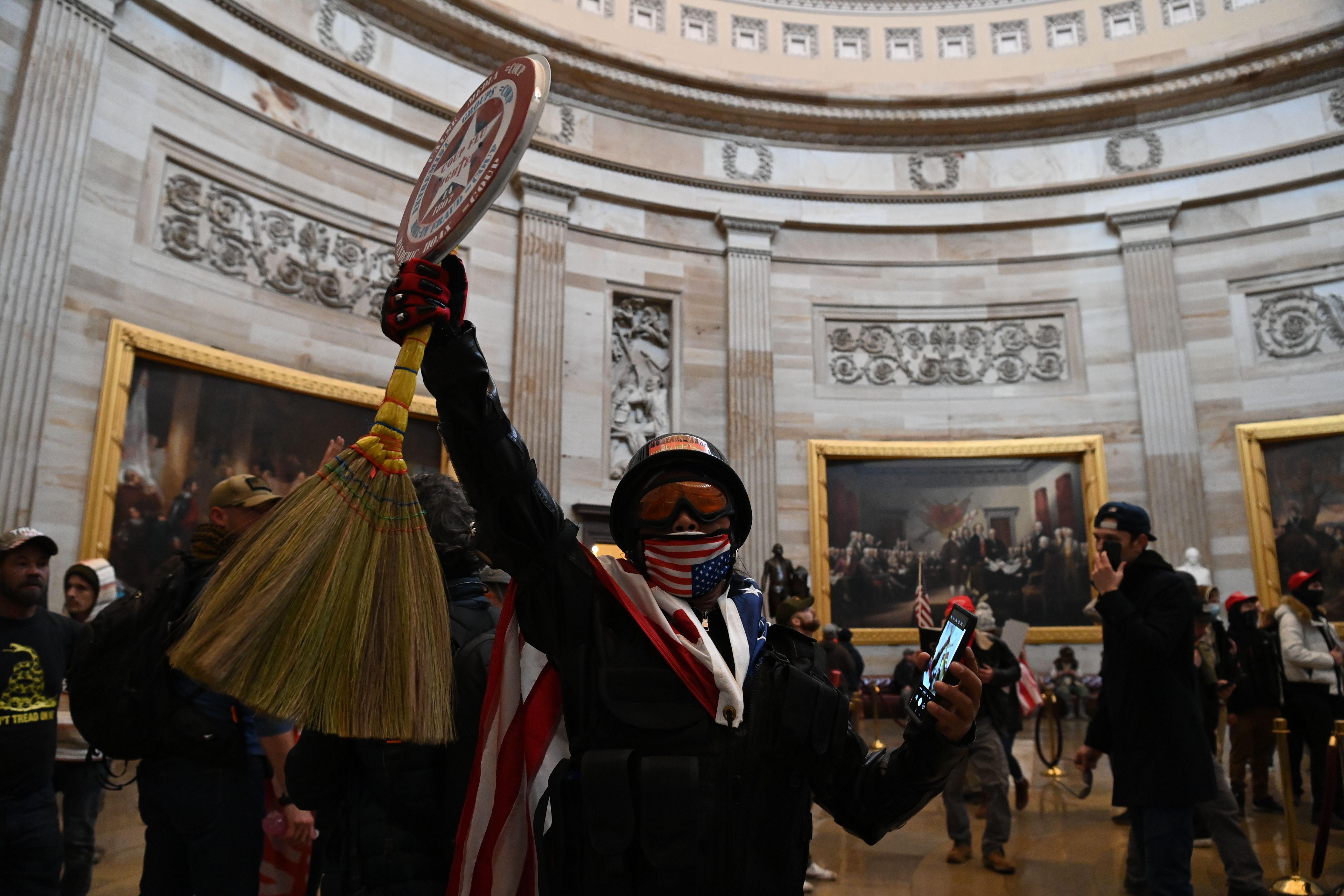 Supporters of US President Donald Trump enter the US Capitol's Rotunda on January 6, 2021, in Washington, DC. - Demonstrators breeched security and entered the Capitol as Congress debated the a 2020 presidential election Electoral Vote Certification. (Photo by Saul LOEB / AFP) (Photo by SAUL LOEB/AFP via Getty Images)