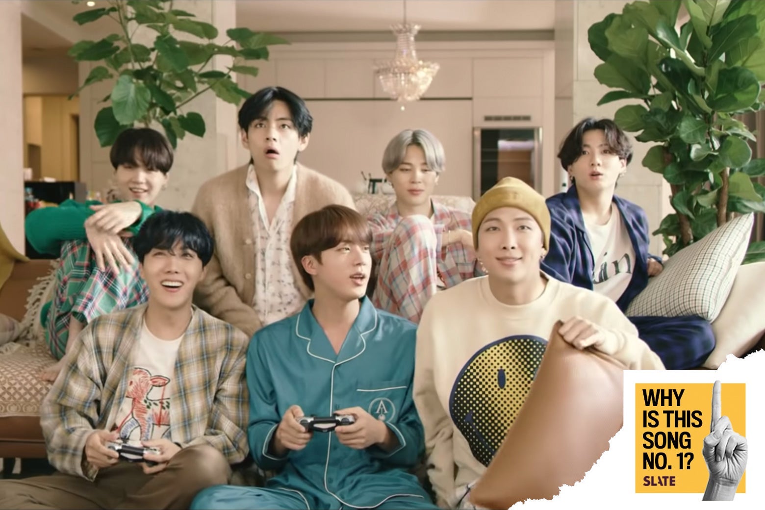 BTS hanging out together on the couch.