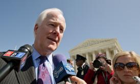 Sen. John Cornyn, R-Tex., is interviewed after leaving the U.S. Supreme Court in Washington, D.C., after the morning session March 27, 2012