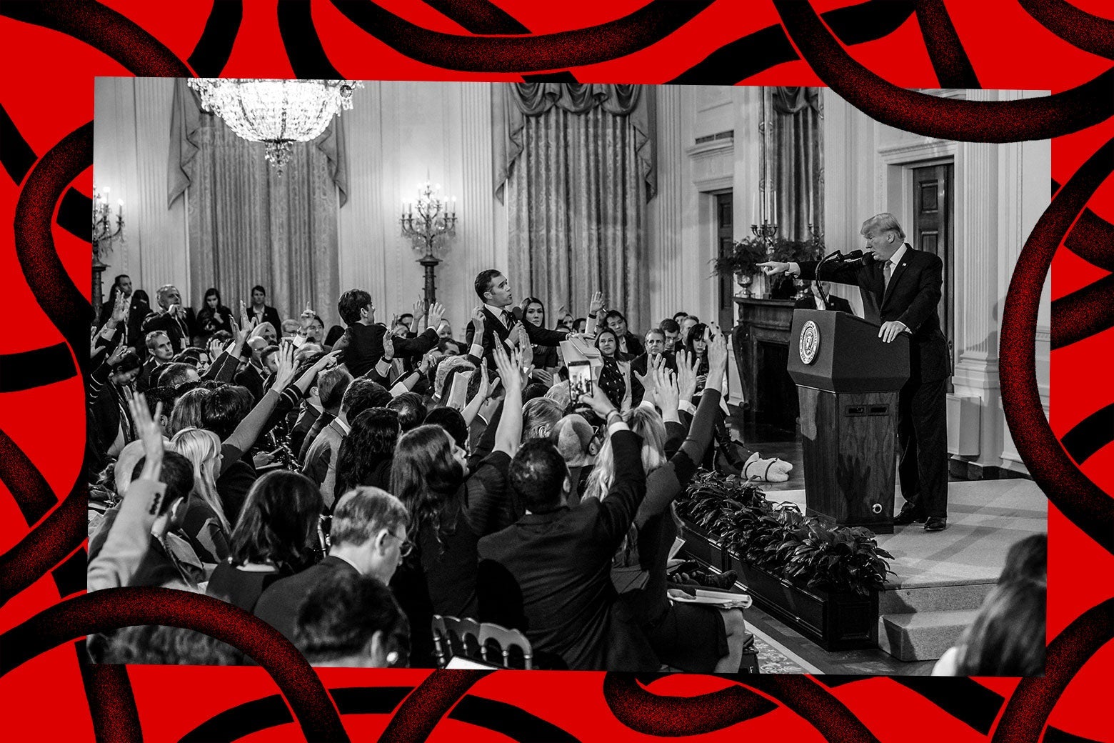 US President Donald Trump points to journalist Jim Acosta(Center L) from CNN during a post-election press conference in the East Room of the White House in Washington, DC on November 7, 2018.