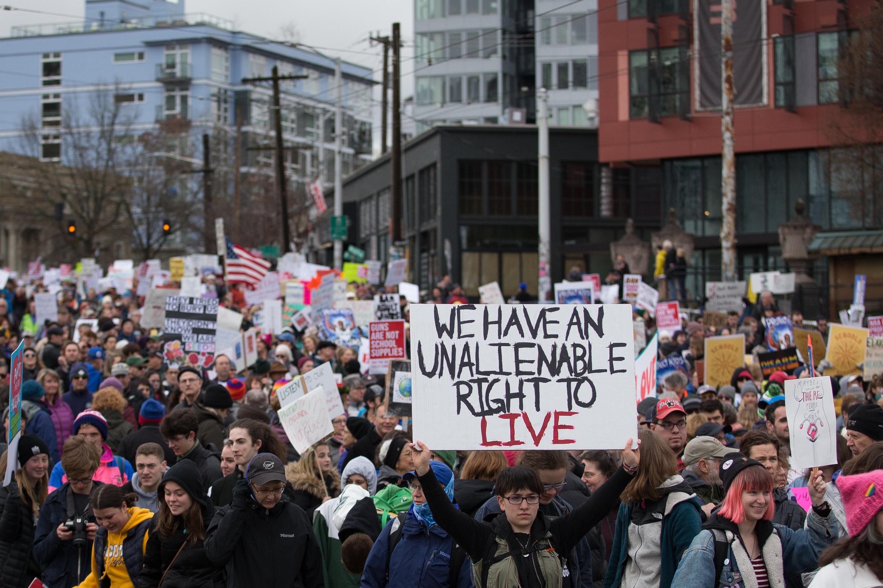 Thousands of people march down Pine Street towards downtown Seattle during the March for Our Lives rally on March 24, 2018 in Seattle, Washington.