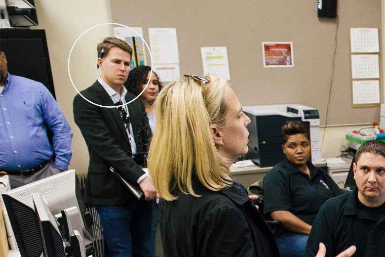 Miles Taylor is seen in a room with Kirstjen Nielsen and other DHS officials. His head is circled.