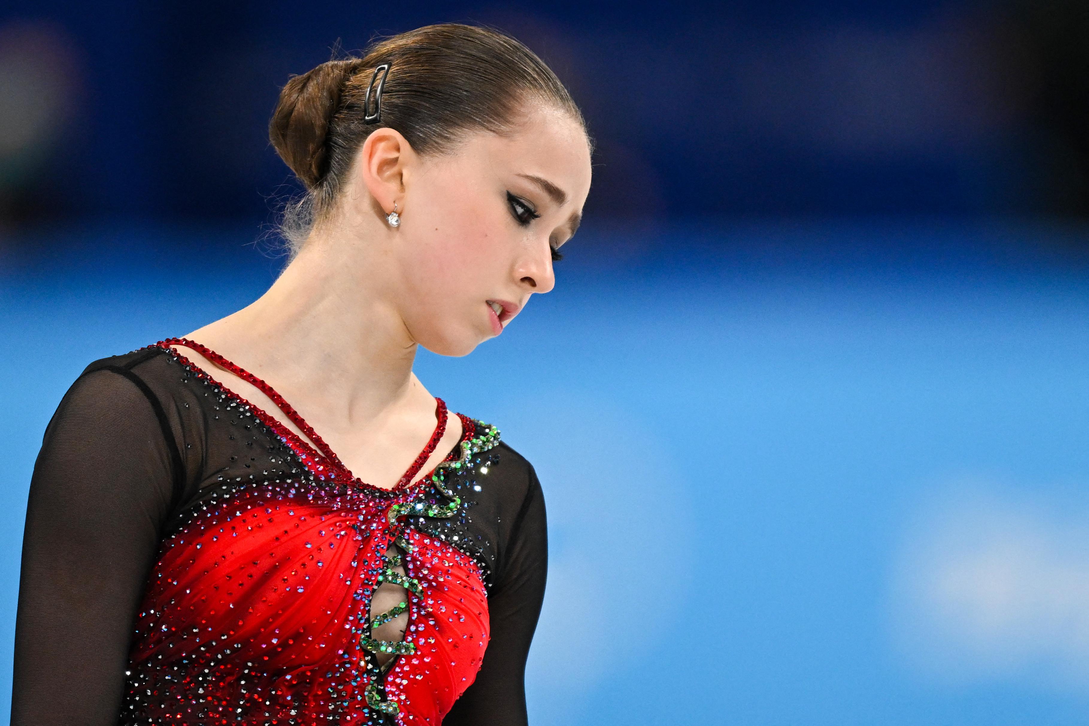 Valieva looks down at the ice in disappointment