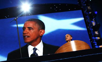 President Barack Obama speaks on stage as he accepts the nomination for president.