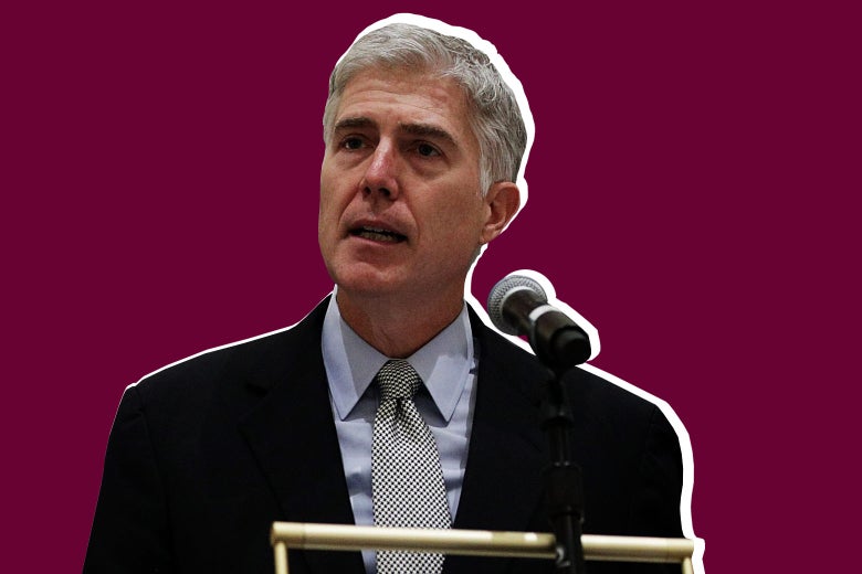 Supreme Court Justice Neil Gorsuch speaks at a podium.