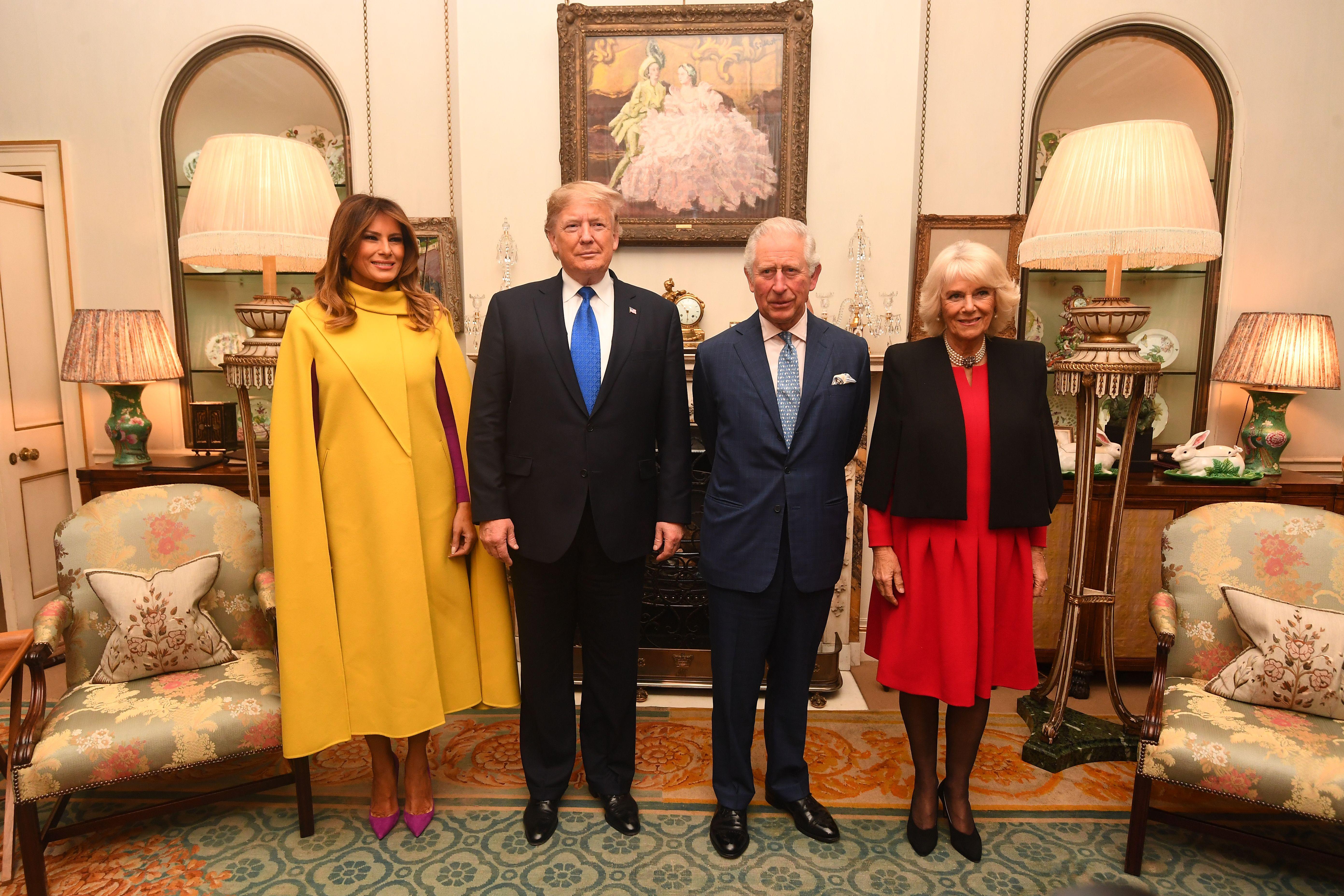 Britain's Prince Charles, Prince of Wales (2nd R) and Britain's Camilla, Duchess of Cornwall (R) meet US President Donald Trump (2nd L) and US First Lady Melania Trump (L) pose for a photograph at Clarence House in central London on December 3, 2019, ahead of the NATO alliance summit. - NATO leaders gather Tuesday for a summit to mark the alliance's 70th anniversary but with leaders feuding and name-calling over money and strategy, the mood is far from festive. (Photo by Victoria Jones / POOL / AFP) (Photo by VICTORIA JONES/POOL/AFP via Getty Images)