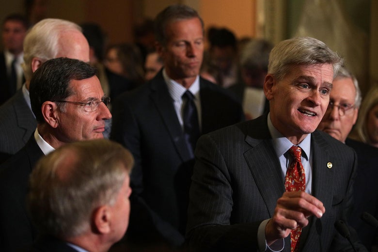 WASHINGTON, DC - SEPTEMBER 19: U.S. Sen. Bill Cassidy (R-LA) (2nd R) speaks as (L-R) Sen. Lindsey Graham (R-SC), Sen. John Barrasso (R-WY), Sen. John Thune (R-SD), and Senate Majority Leader Sen. Mitch McConnell (R-KY) listen during a news briefing after the weekly Senate Republican policy luncheon at the Capitol September 19, 2017 in Washington, DC. Senate Republican held a weekly policy luncheon to discuss GOP agenda. (Photo by Alex Wong/Getty Images)