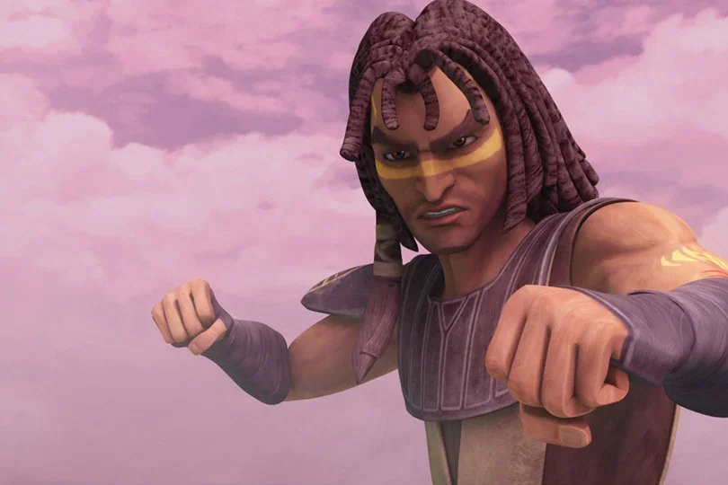 A very buff human-looking computer-animated figure raises his fists, his brow furrowed at the viewer. He wears what look like the Star Wars equivalent of football pads, with his hair maybe in braids or locks. Across his face, there's a line of what looks like yellow paint.