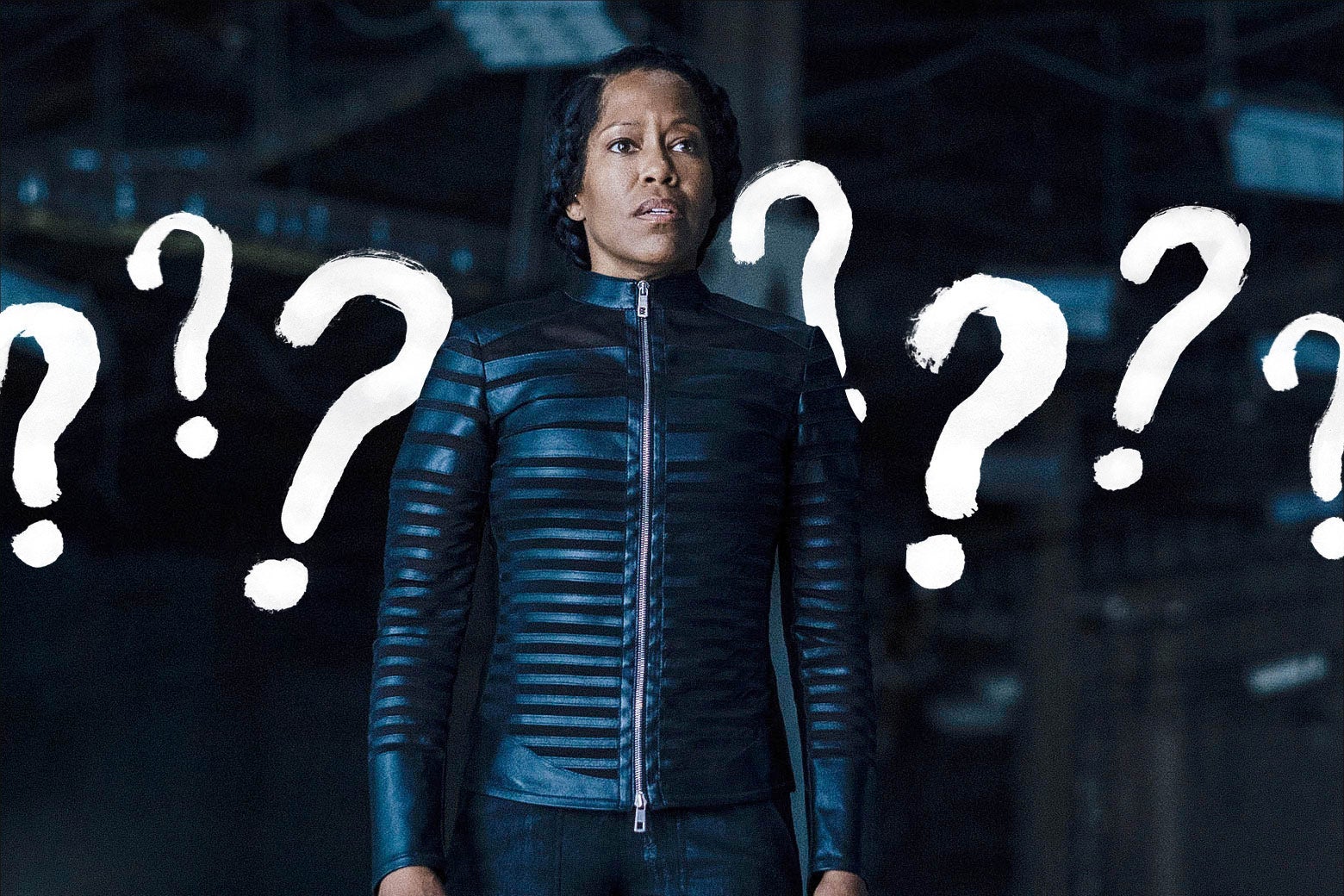 Regina King, in costume as Angela Abar from Watchmen, stands in a warehouse looking confused. Giant question marks are drawn all over the background.