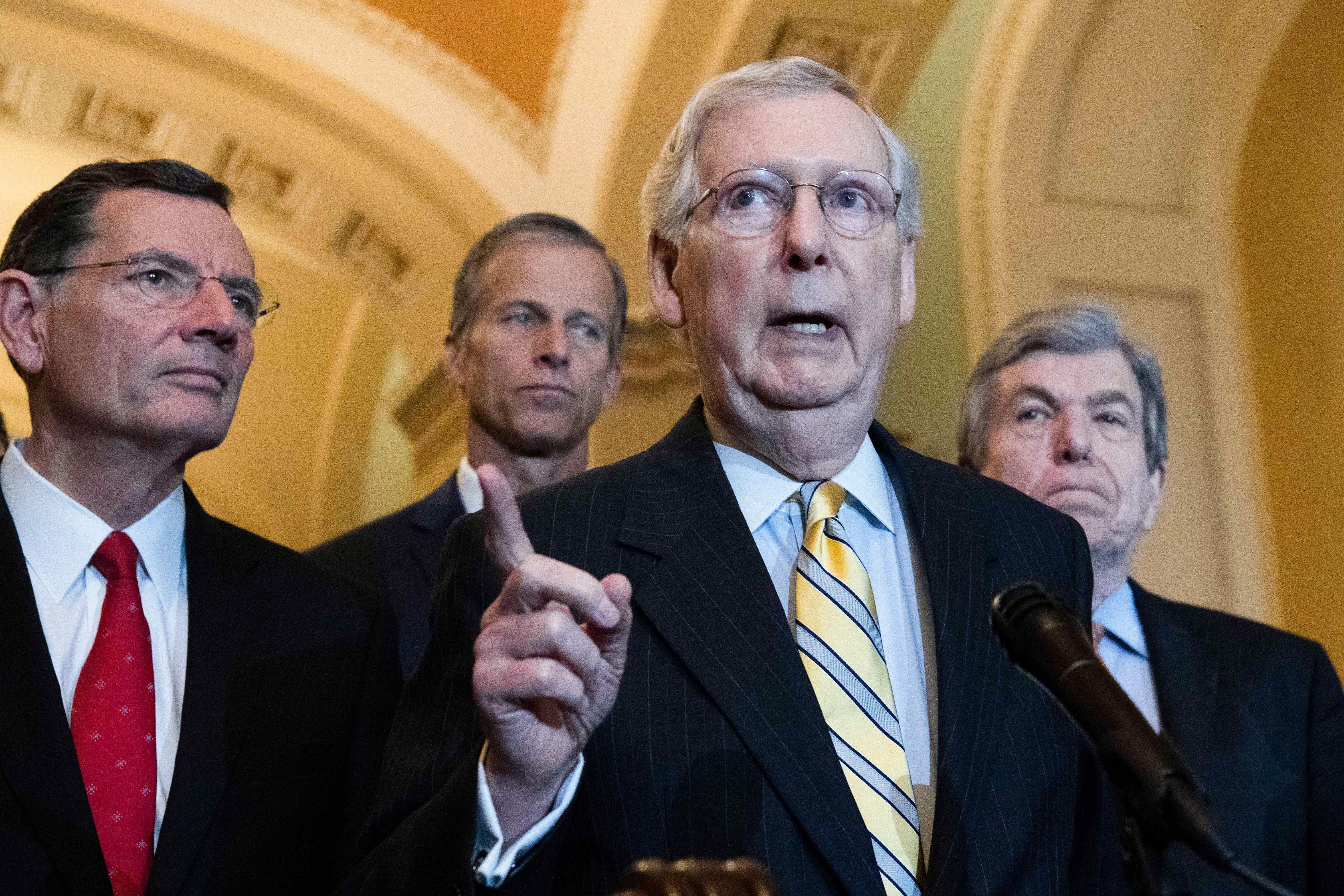 Senate Majority Leader Mitch McConnell, flanked by Republican Senators speaks to the press at the Capitol in Washington, DC, on May 14, 2019.