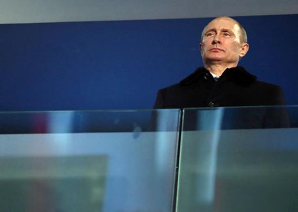 Vladimir Putin the President of Russia watches the Opening Ceremony of the Sochi 2014 Paralympic Winter Games.