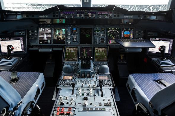 Air traffic controllers call up pilots to give them instructions, inquire about their intentions, and relay information. Above, the cockpit of an Airbus A380 in 2012.