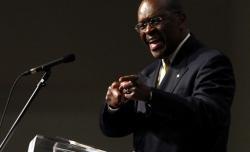 Herman Cain speaks to a crowd at Ohio Christian University on Oct. 13.