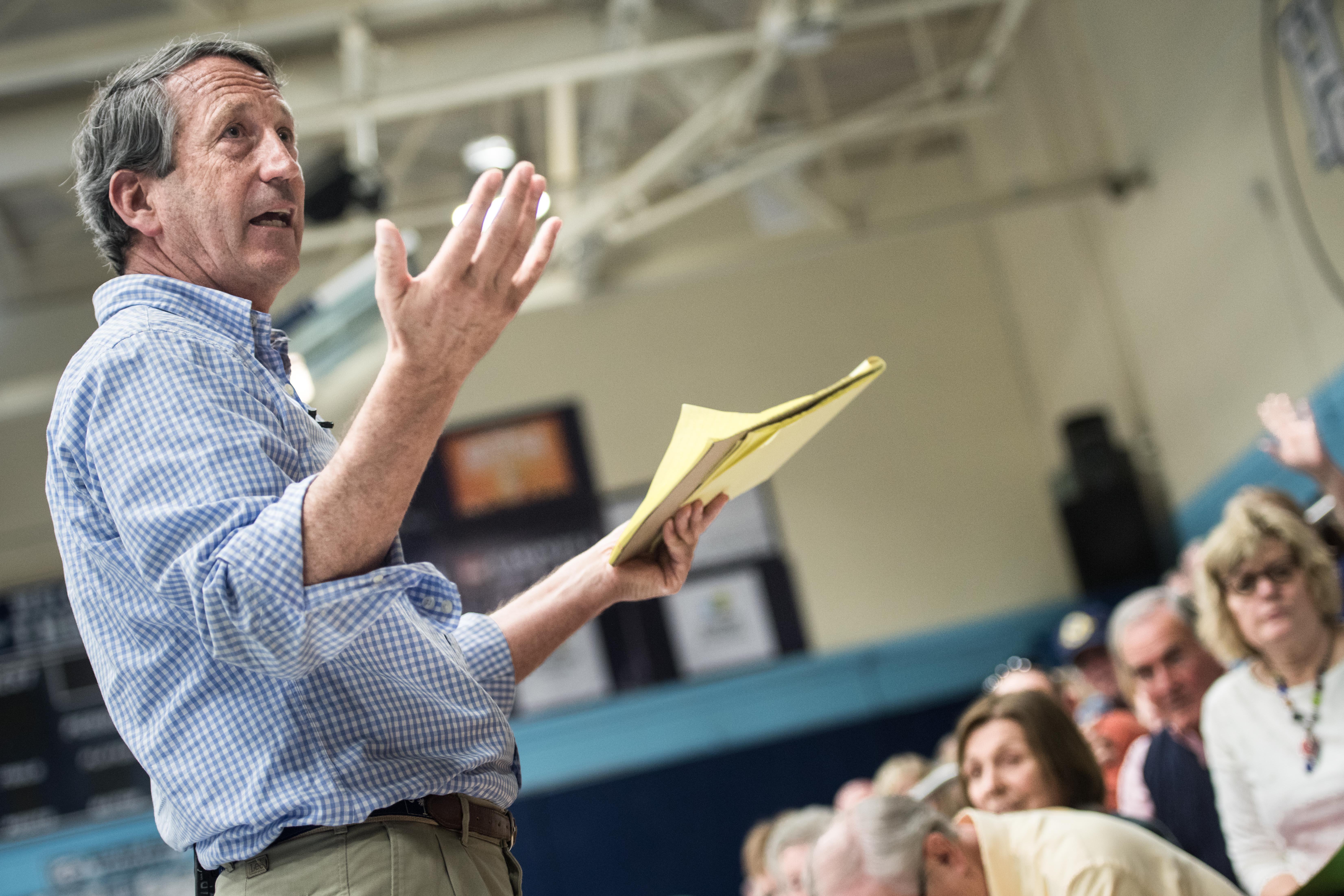 HILTON HEAD, SC - MARCH 18: Rep. Mark Sanford (R-SC) addresses the crowd during a town hall meeting March 18, 2017 in Hilton Head, South Carolina. Protestors have been showing up in large numbers to congressional town hall meetings across the nation. (Photo by Sean Rayford/Getty Images)