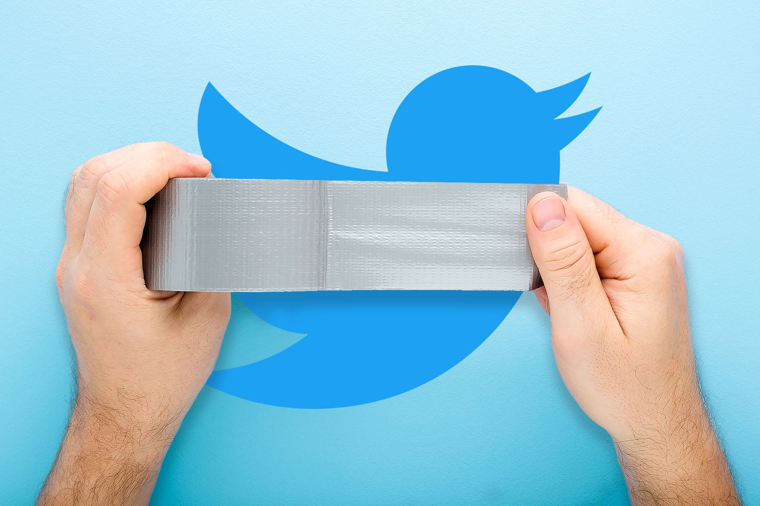 Hands pulling a roll of duct tape over the Twitter bird logo