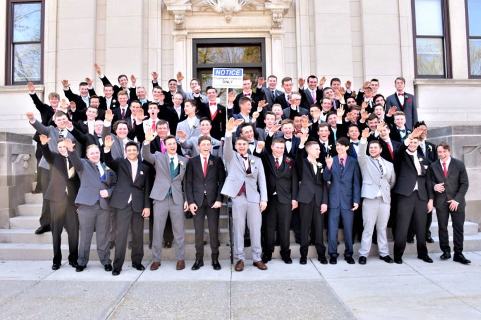 Baraboo High School boys make what appear to be Nazi salutes in a group photo.