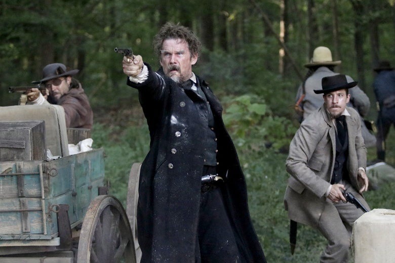 Ethan Hawke, playing John Brown, points a gun in The Good Lord Bird.