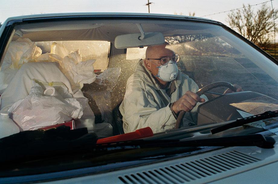 Thilde Jensen Canaries Randy in his car and home. Tucson, Ariz., 2005.