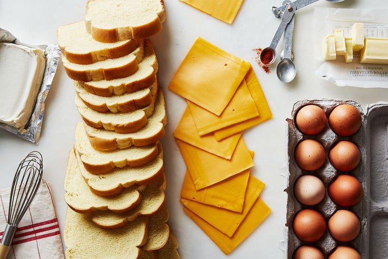 Cream cheese, bread, sliced cheese, butter, and eggs.