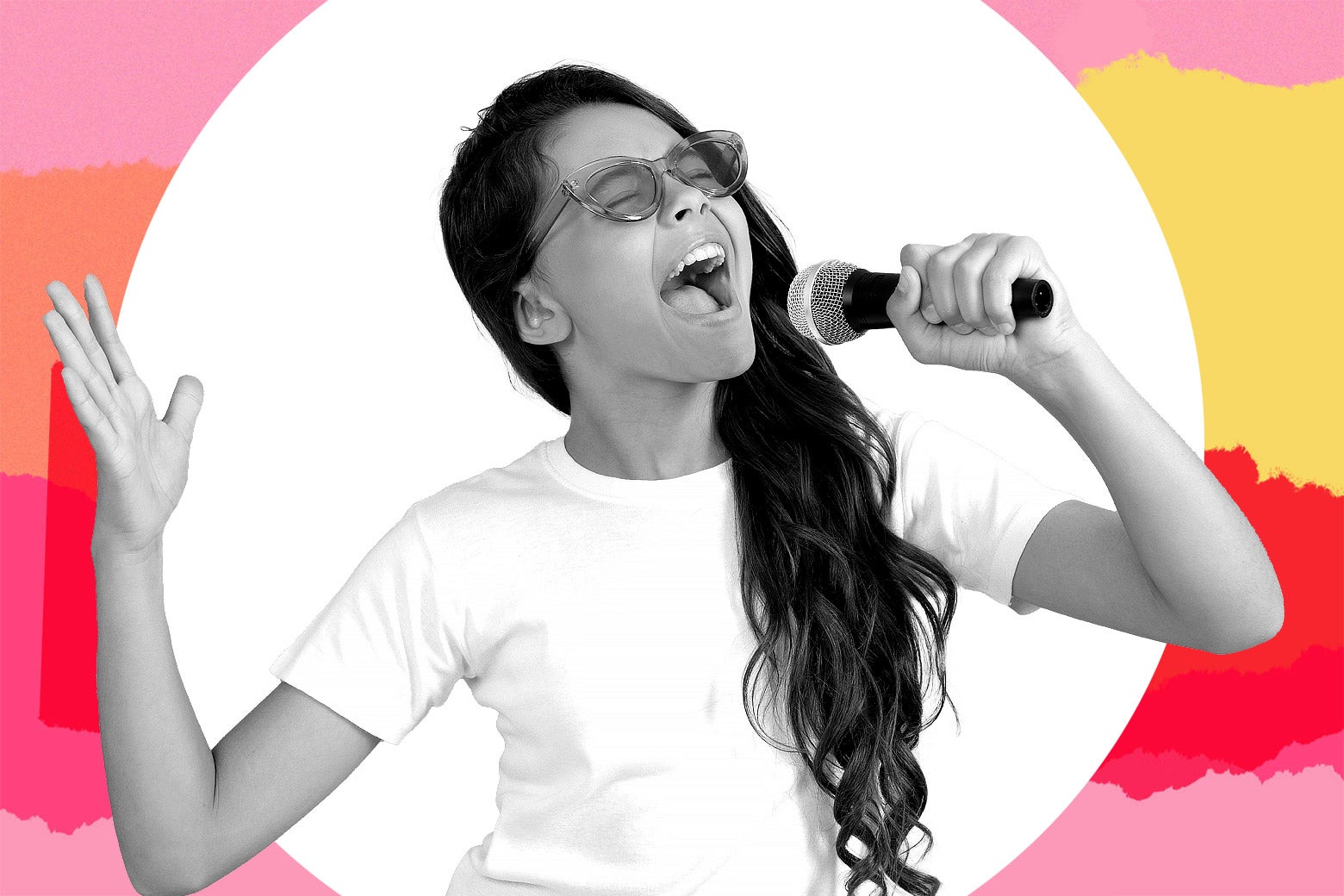 Young girl singing into a mic.