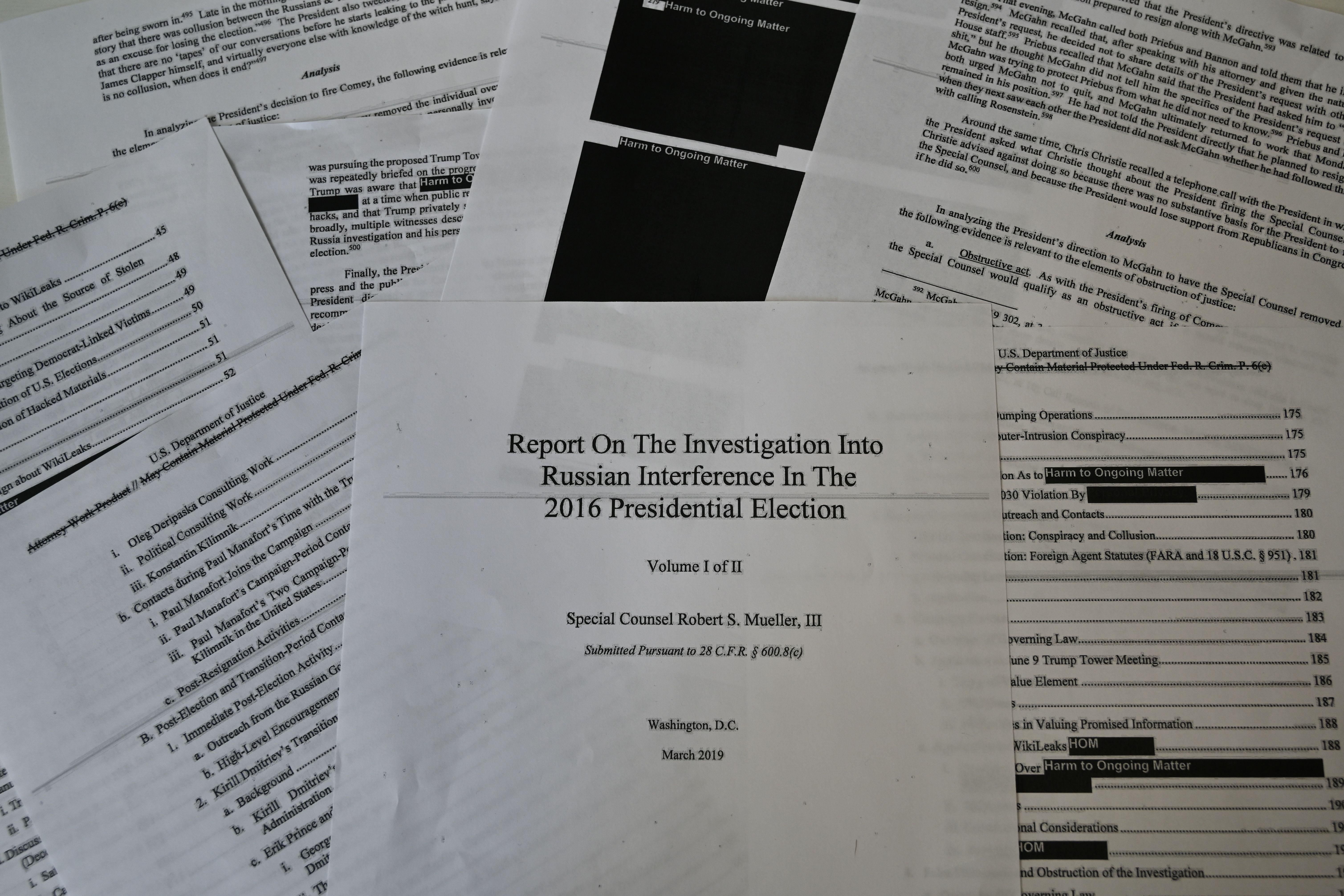 An illustration shows printed pages of the redacted Mueller Report on April 18, 2019, in Washington, DC. 
