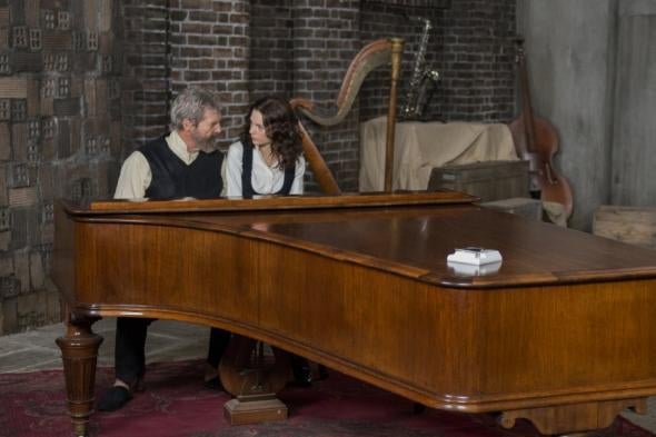 Jeff Bridges and Taylor Swift sit at a piano in a still from the movie.