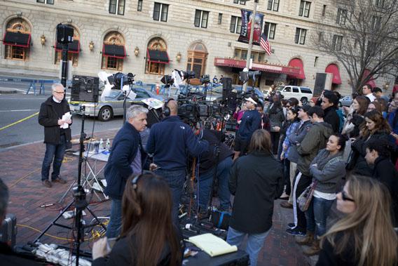 Two days after the tragedy, Wolf Blitzer of CNN attracts a crowd as he waits to go on air in Copley Square, close to the site of the Boston Marathon bombings, on April 17, 2013. Boston has been inundated with media from around the country and the world.