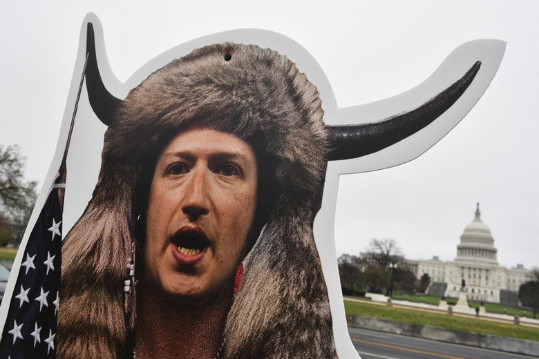 An effigy of Facebook CEO, Mark Zuckerberg, dressed as a January 6, 2021, insurrectionist is placed near the US Capitol in Washington, DC, on March 25, 2021. - Protester set up effigies of Big Tech CEO's as the US Congress holds hearings March 25 about the spread of disinformation and misinformation on their platforms. (Photo by MANDEL NGAN / AFP) (Photo by MANDEL NGAN/AFP via Getty Images)