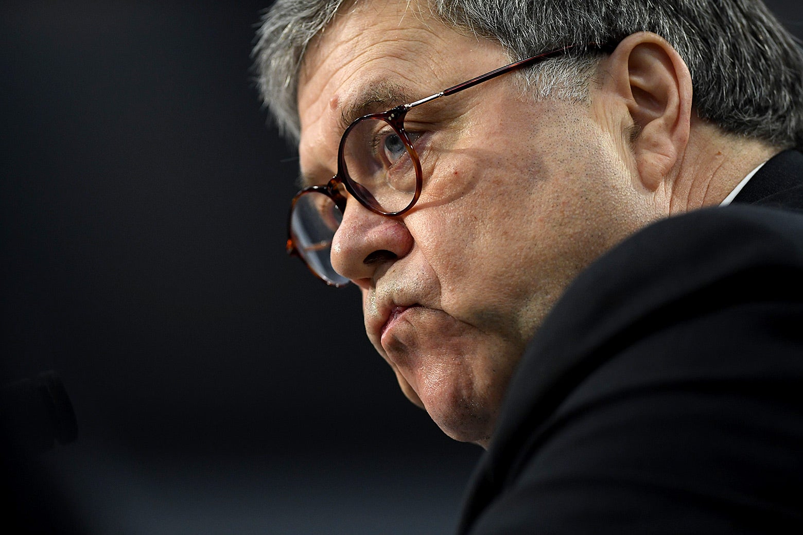 William Barr purses his lips, considers how best to spin his lies.