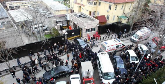 Police and forensic experts working on Feb. 1, 2013, at the site of a blast outside the U.S. Embassy in Ankara