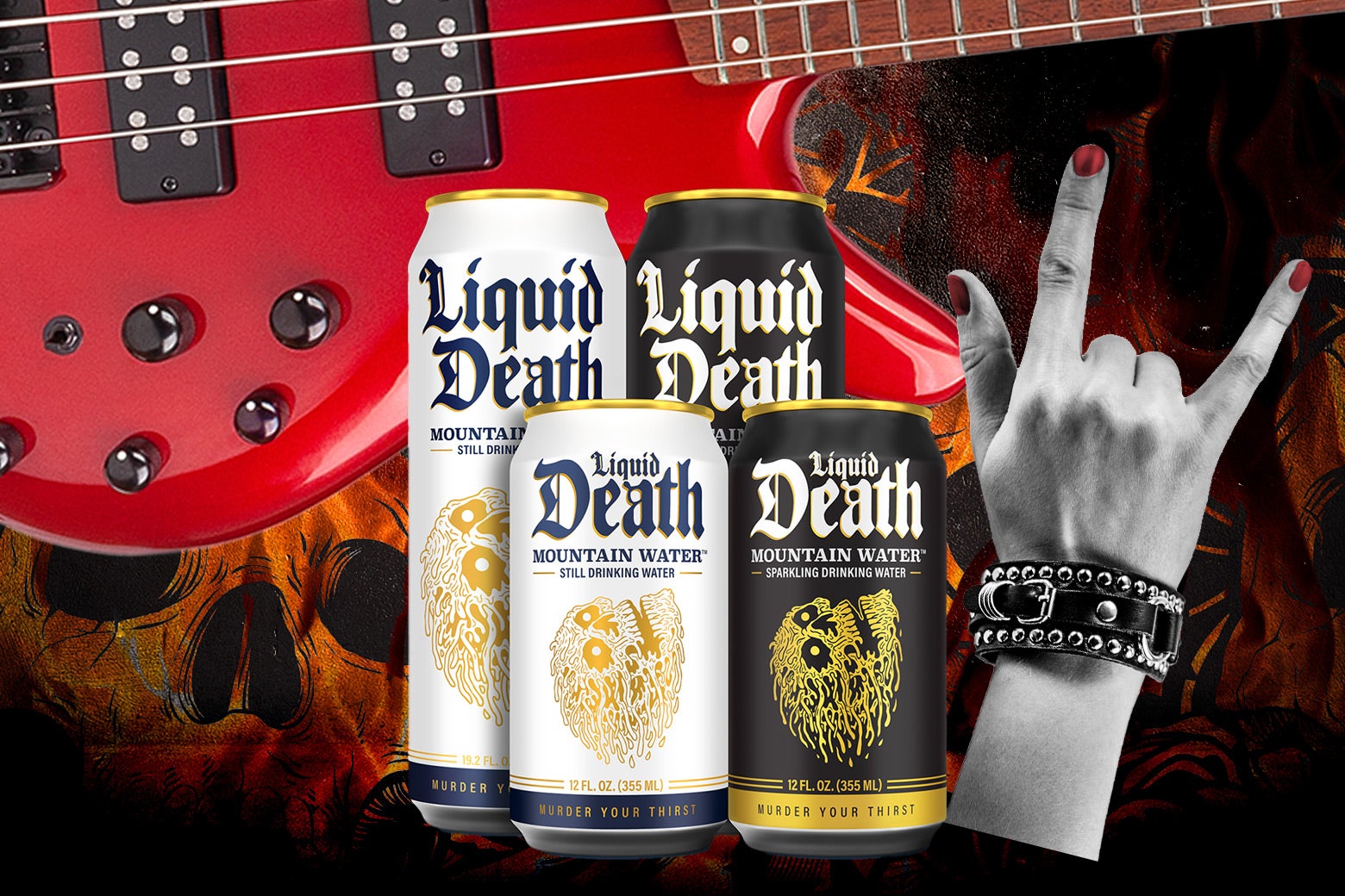 Cans of Liquid Death in front of a red electric guitar and a raised hand making the rocker sign.