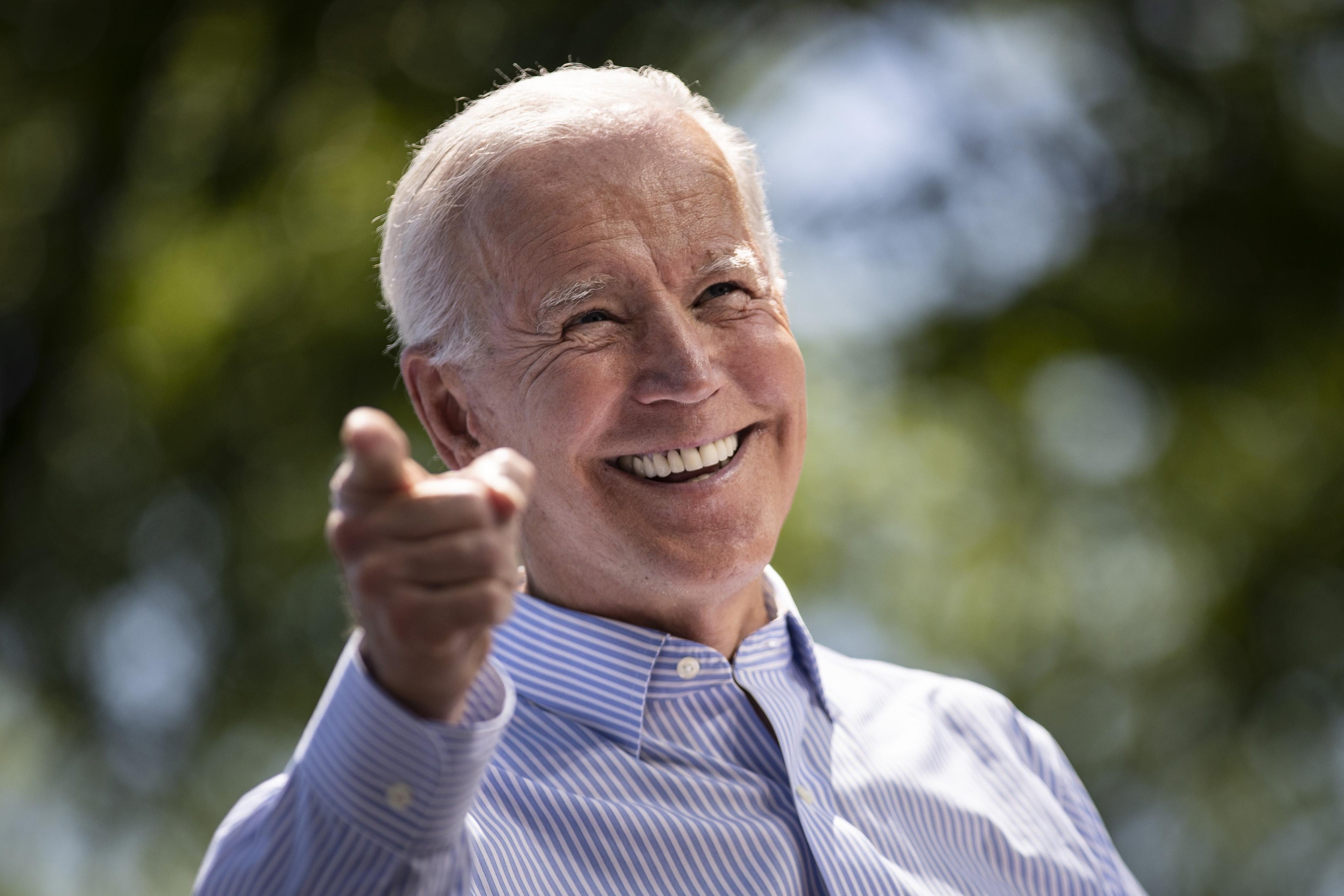 Joe Biden points toward the camera.