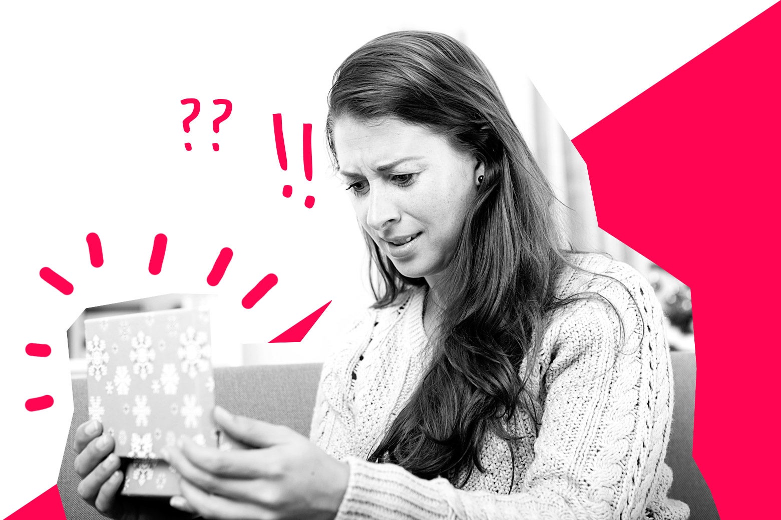 A woman looking disgustingly at a gift she just opened.