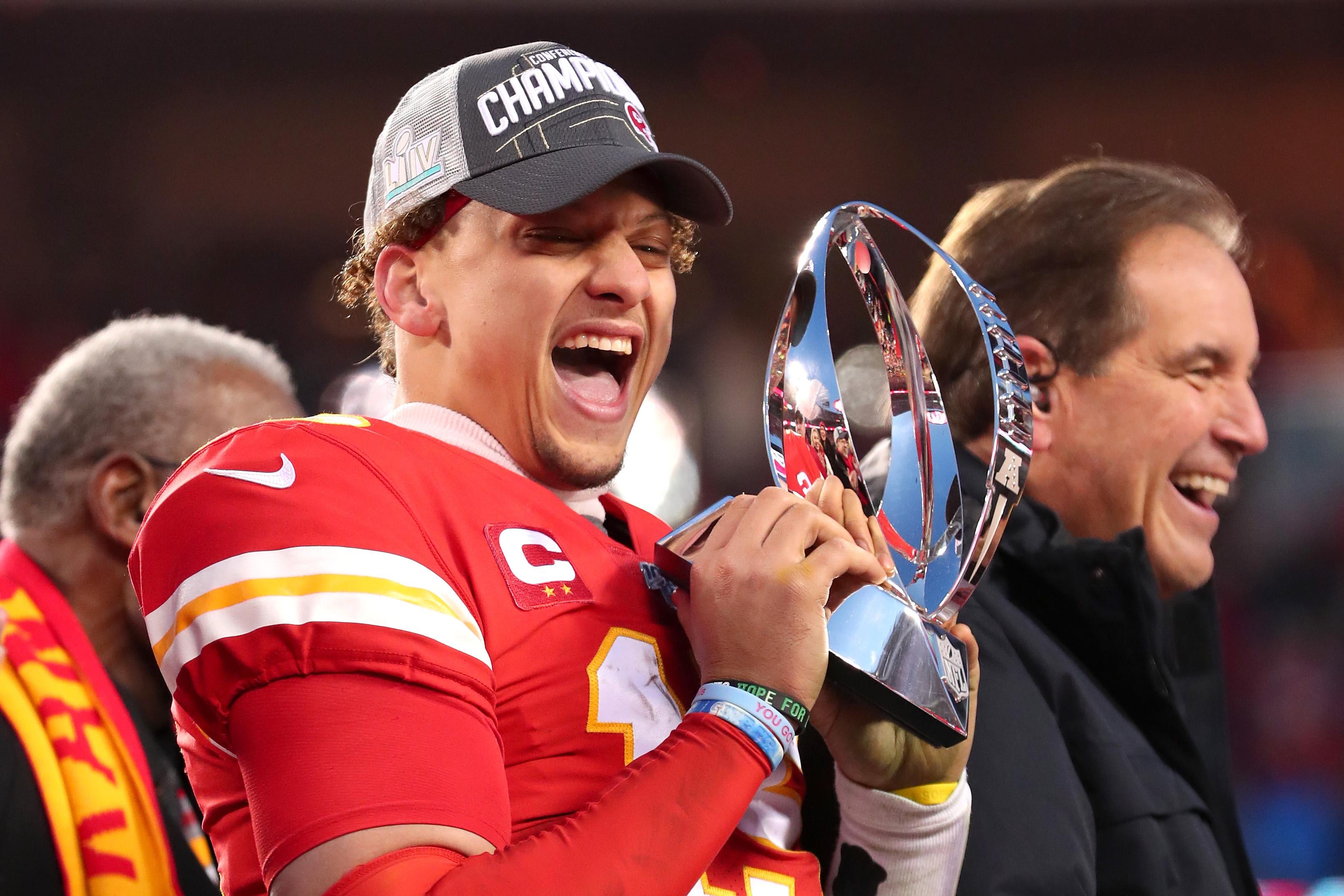 Kansas City Chiefs' Patrick Mahomes celebrates with the Lamar Hunt Trophy  after the NFL AFC Championship football game against the Tennessee Titans  Sunday, Jan. 19, 2020, in Kansas City, MO. The Chiefs