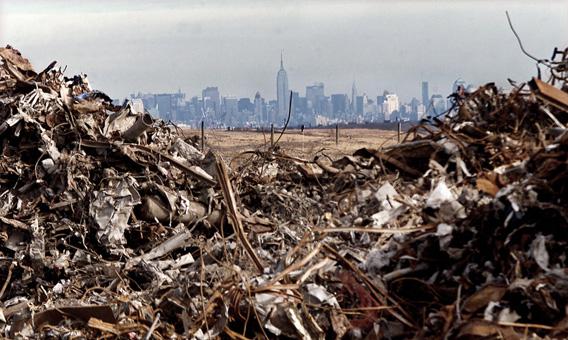 The Empire State Building and the Manhattan skyline are framed by some of the hundreds of thousands of tons of debris from the attacks on the World Trade Center that are piled at the Fresh Kills landfill on the Staten Island section of New York City, January 14, 2002.