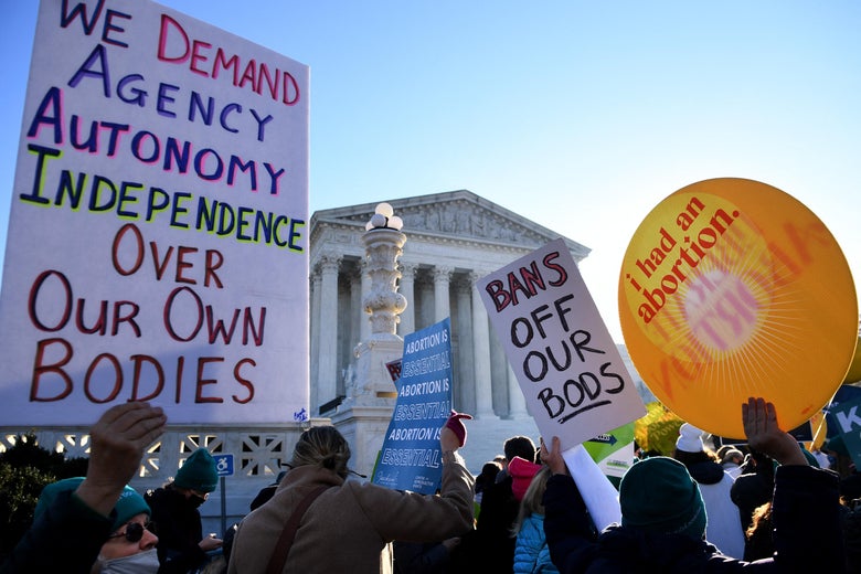 Abortion rights advocates and anti-abortion protesters demonstrate in front of the US Supreme Court in Washington, DC, on December 1, 2021. - The justices weigh whether to uphold a Mississippi law that bans abortion after 15 weeks and overrule the 1973 Roe v. Wade decision. (Photo by OLIVIER DOULIERY / AFP) (Photo by OLIVIER DOULIERY/AFP via Getty Images)