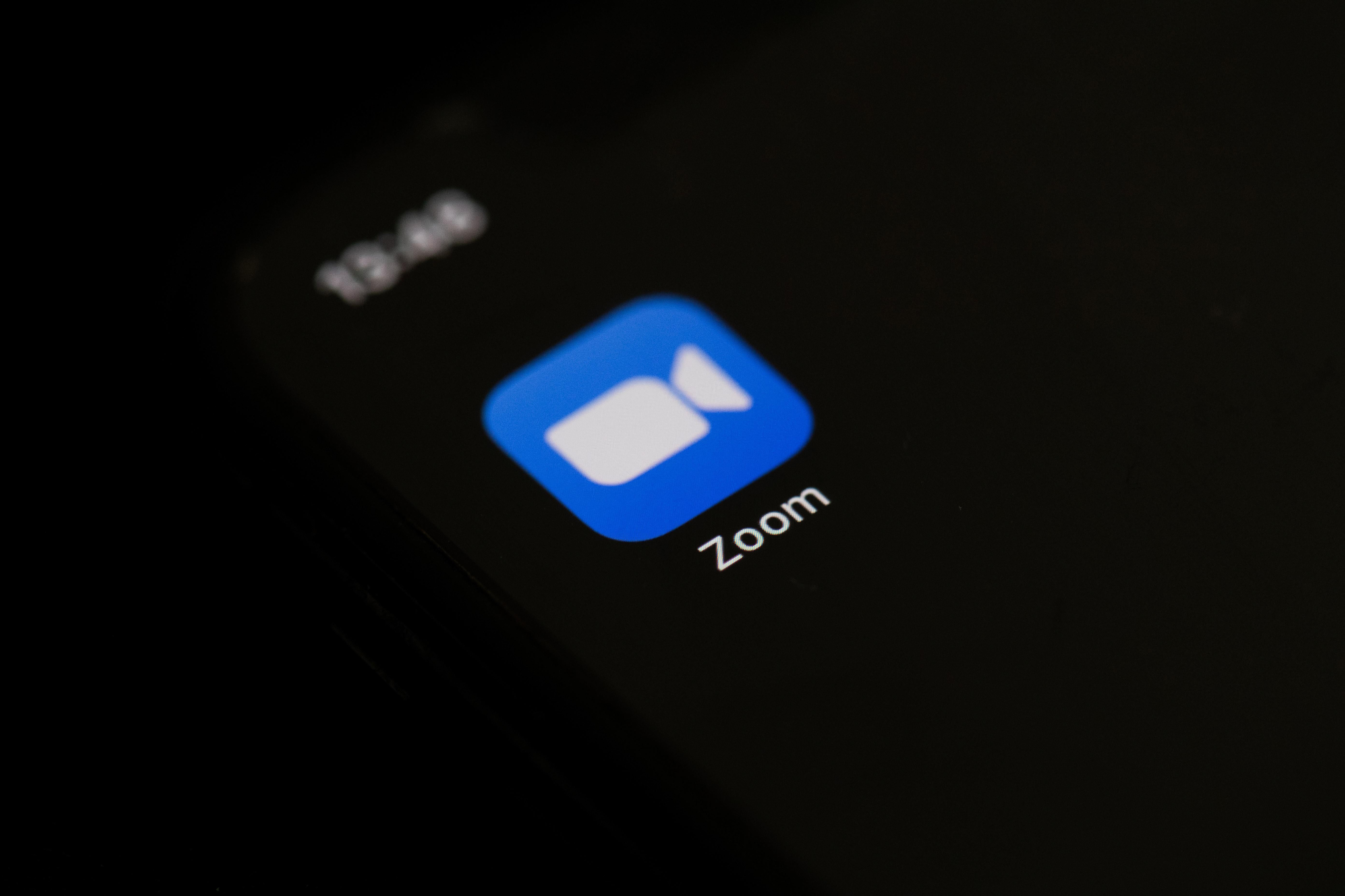 The logo of Zoom, a blue square with a white video camera inside.