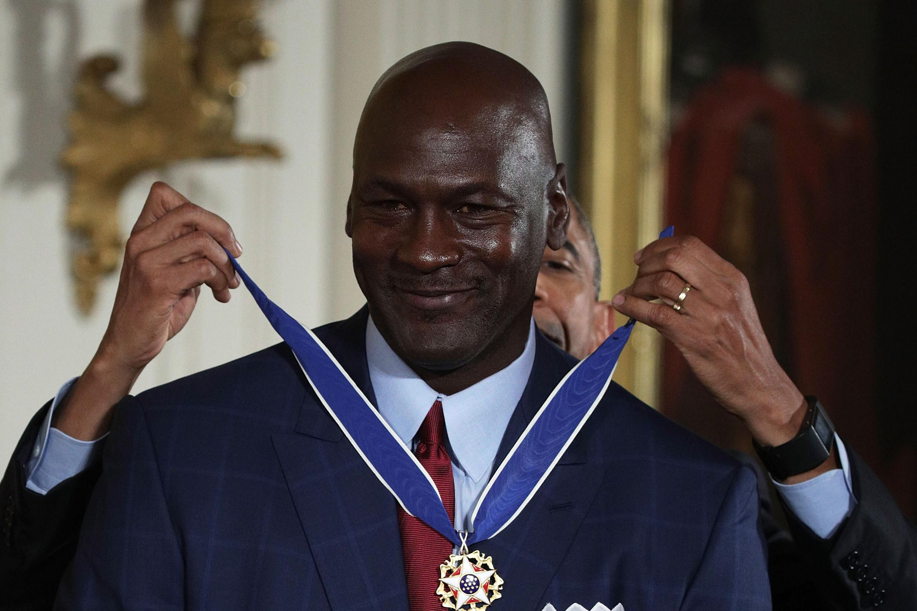 WASHINGTON, DC - NOVEMBER 22:  U.S. U.S. President Barack Obama presents the Presidential Medal of Freedom to former NBA star Michael Jordan during an East Room ceremony at the White House November 22, 2016 in Washington, DC. The Presidential Medal of Freedom is the highest honor for civilians in the United States of America.  (Photo by Alex Wong/Getty Images)