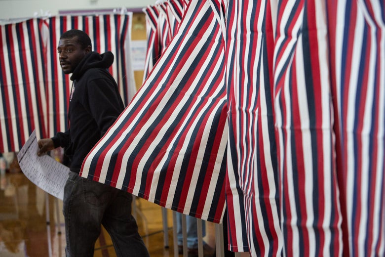A voter casts his ballot on Nov. 8, 2016, in Nashua, New Hampshire.