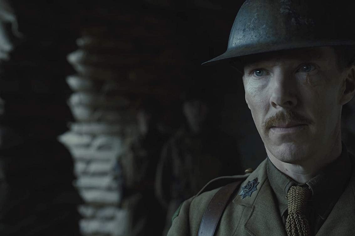 Benedict Cumberbatch wears a WWI-era uniform and helmet.