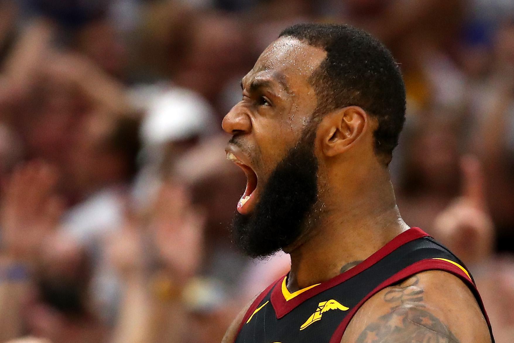 CLEVELAND, OH - MAY 25:  LeBron James of the Cleveland Cavaliers reacts after a basket in the fourth quarter against the Boston Celtics during Game Six of the 2018 NBA Eastern Conference Finals at Quicken Loans Arena on May 25, 2018 in Cleveland, Ohio. NOTE TO USER: User expressly acknowledges and agrees that, by downloading and or using this photograph, User is consenting to the terms and conditions of the Getty Images License Agreement.  (Photo by Gregory Shamus/Getty Images)